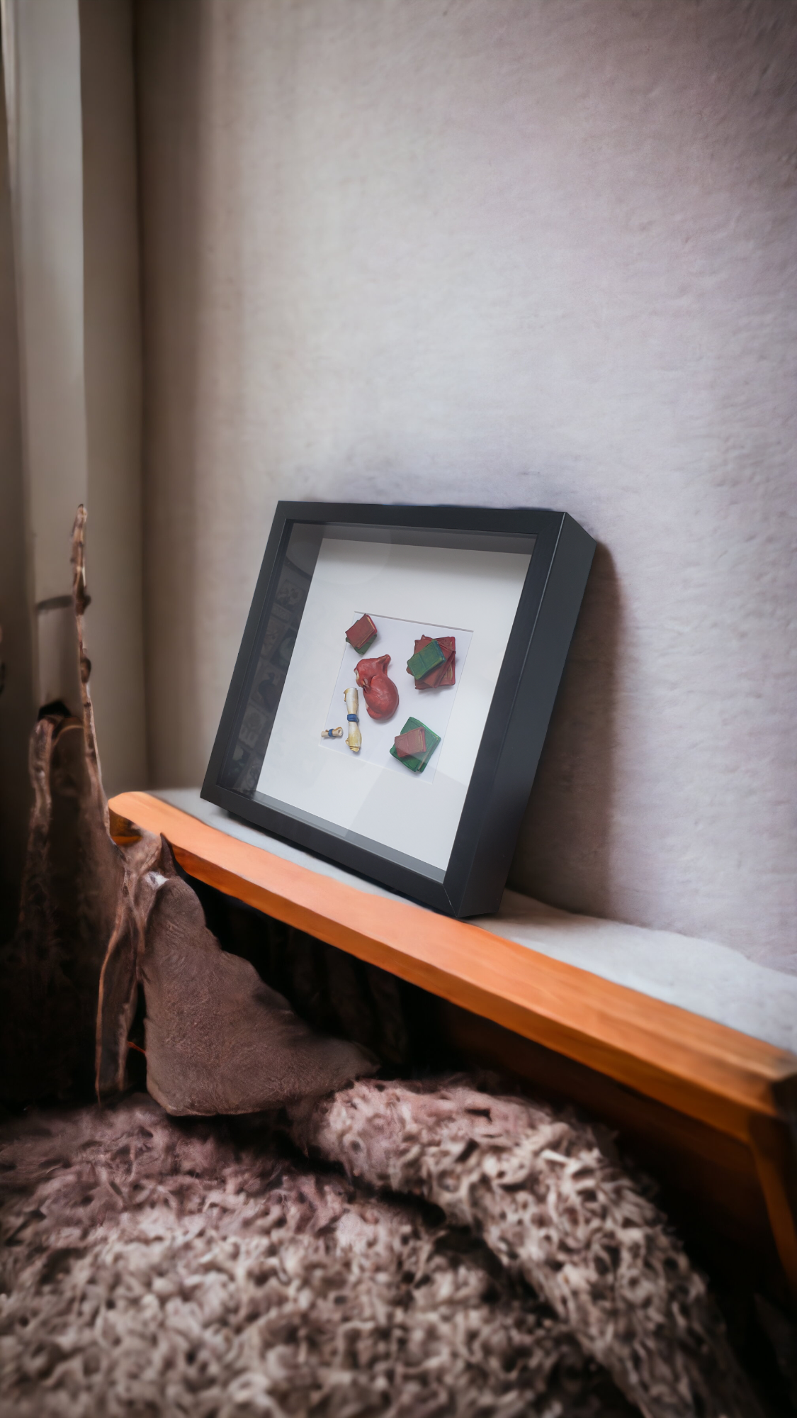 Hand-sculpted diorama of Sleeping fox surrounded by books and scrolls, each piece is created from high-quality clay, expertly shaped to sculpted. With a keen eye for detail, Lindsay hand-paints and finishes every creation, ensuring a lifelike representation. To add a personal touch, Lindsay signs each painting herself.