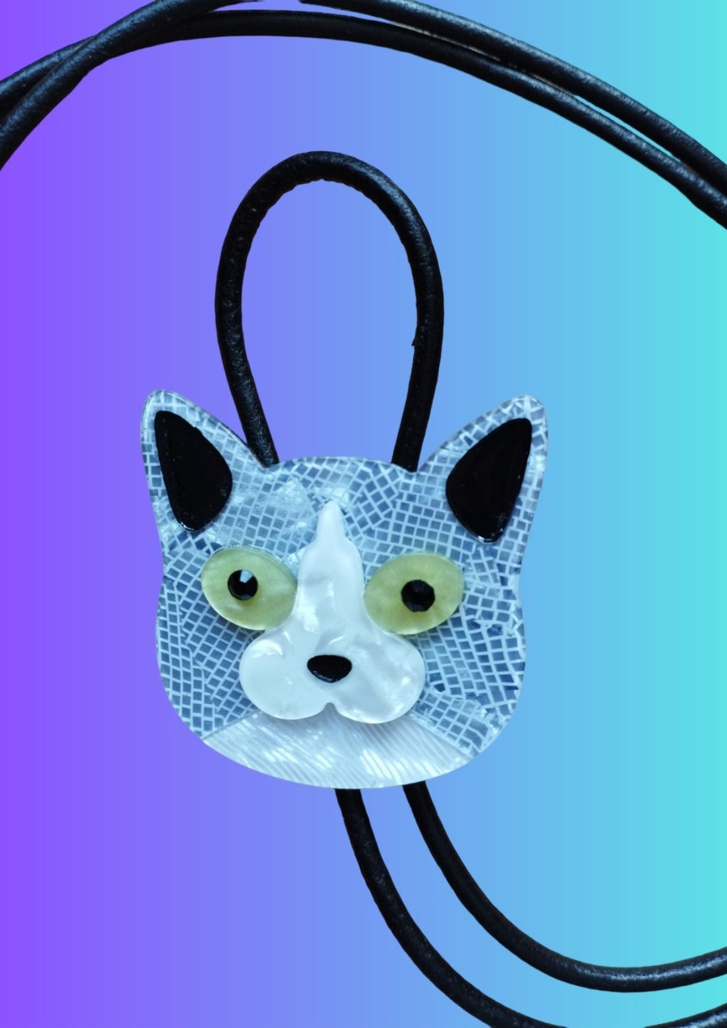 Handcrafted Pussycat Bolo Tie made from High-Quality Acrylic and Leather by Lindsay O'Donnell - closeup