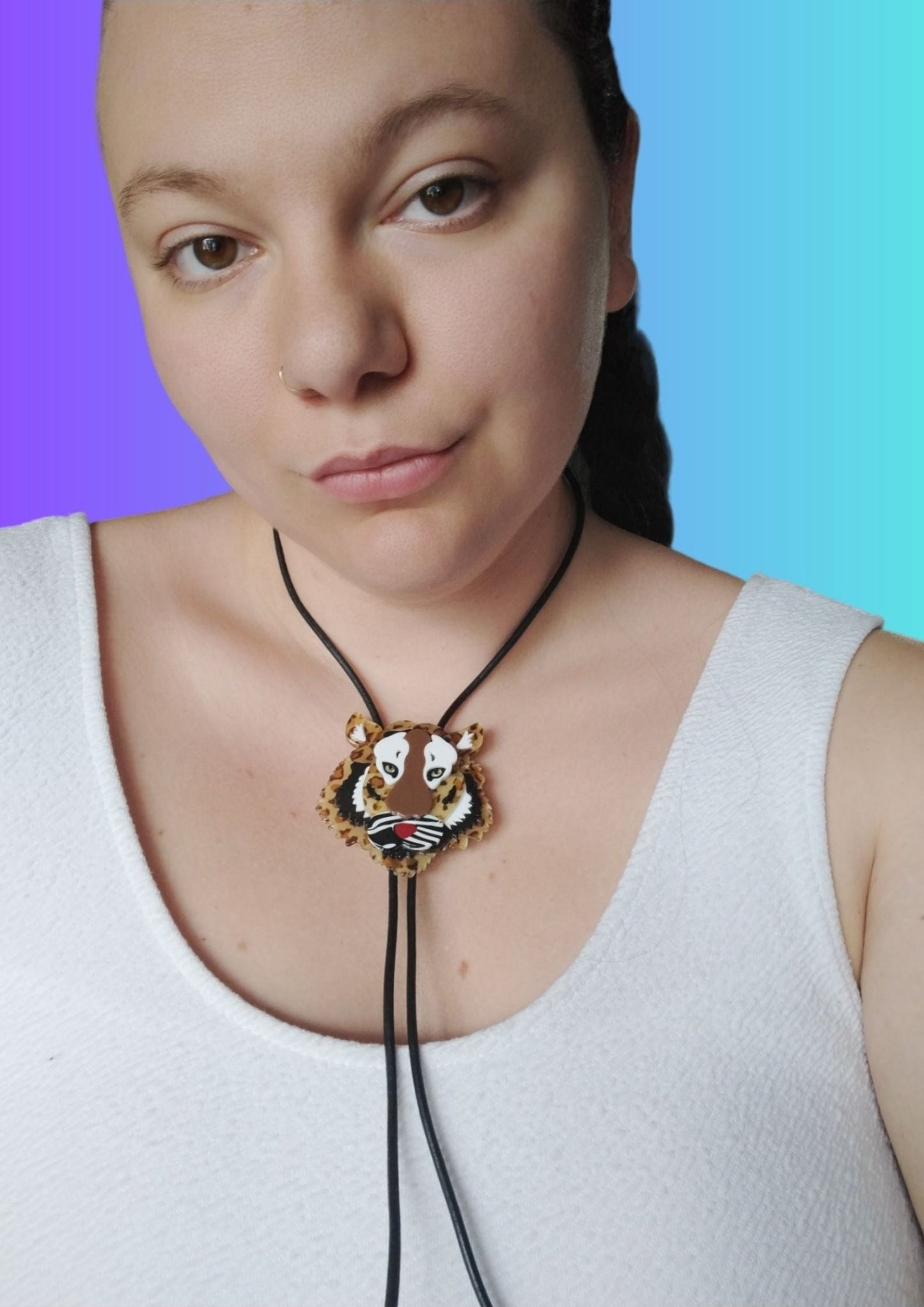 Handcrafted Tiger Bolo Tie by Irish Artist Lindsay O'Donnell - on model, head and shoulders