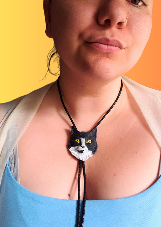 Custom Cat Bolo Tie Handcrafted from Polymer Clay by Lindsay O'Donnell - Squire Bolo, black and white cat, on model